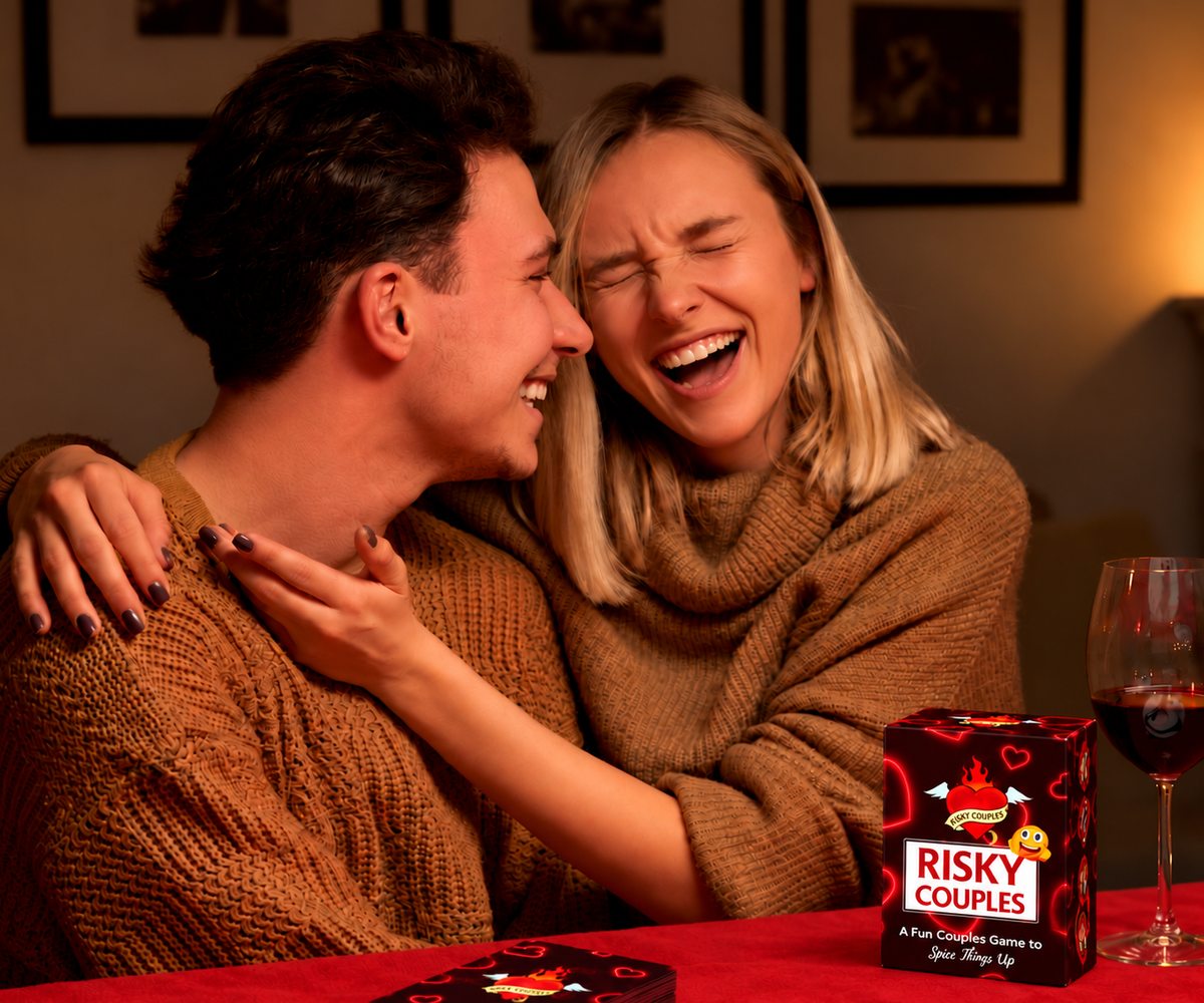 Couple laughing together over Risky Couples