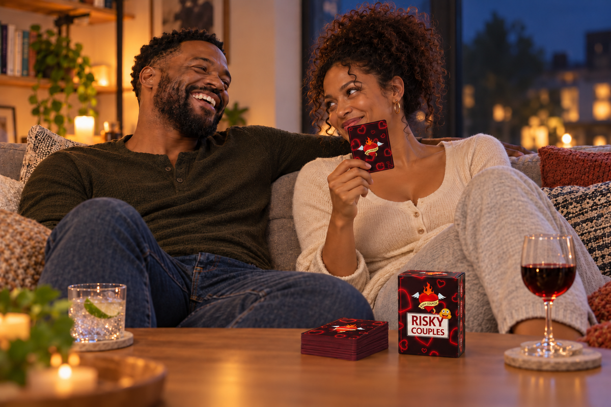 Couple laughing while playing Risky Couples